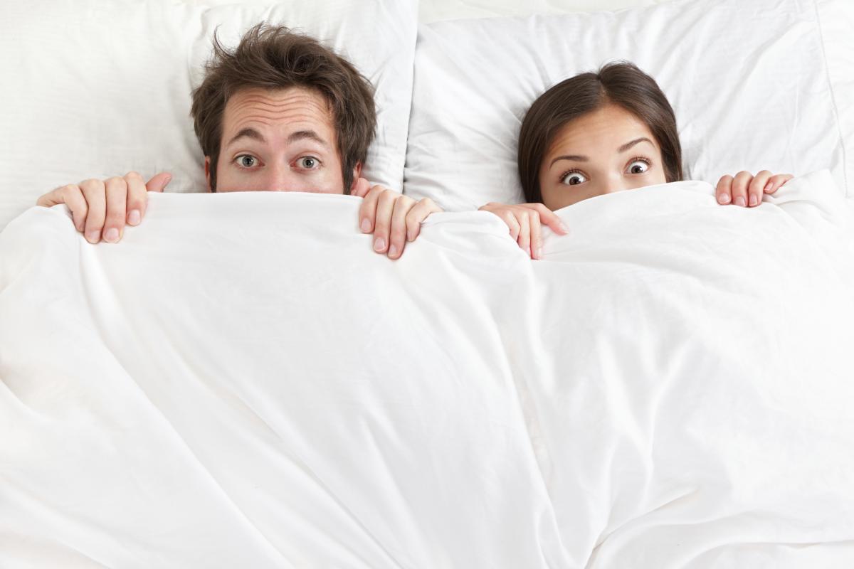 Man and woman in bed sleep