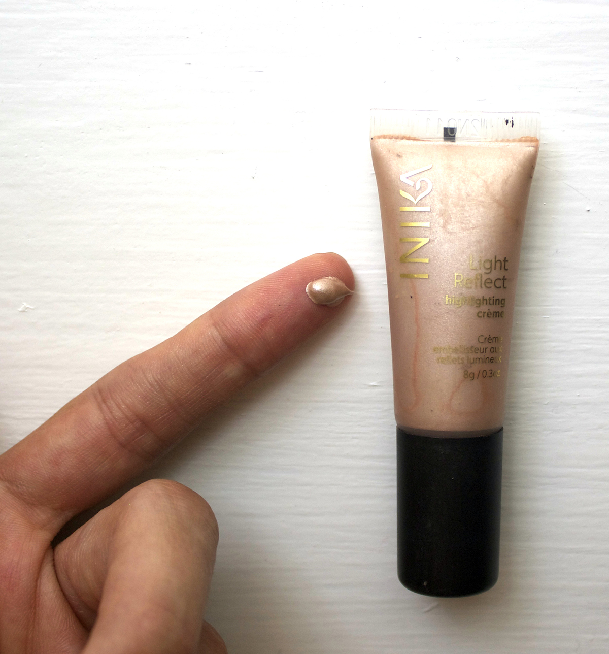 Highlighter/light reflecting cream