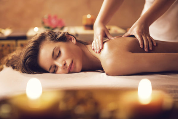 Woman being massaged