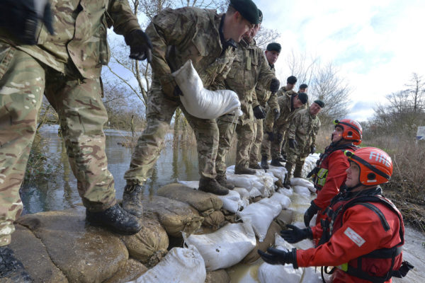 Soldiers helping flood